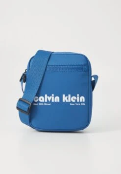 Calvin Klein Jeans GRAPHIC REPORTER - Cross Body Bag - Dark Blue