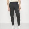 EA7 Emporio Armani Trouser - Tracksuit Bottoms - Notte -Stock X 7fd4843842194d1ab75520cab6f51f1a