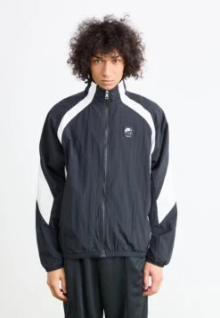 Nike Sportswear AIR TRACK JACKET - Summer Jacket - Black/white -Stock X 806190e56a794d3288b234258b551416