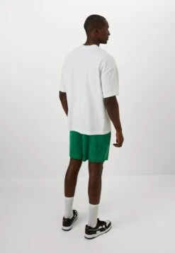 Puma FIF RELAXED SHORTS - National Team Wear - Dark Myrtle 12 Puma FIF RELAXED SHORTS - National Team Wear - Dark Myrtle -Stock X 81ff284b892941cd91770687c3ef3cd1