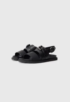 MOSCHINO Sandals - Nero 13 MOSCHINO Sandals - Nero -Stock X 82830adf637b4a7eb4be49895d52333d