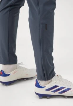 ADIDAS PERFORMANCE FC BAYERN MUENCHEN TIRO25 COMPETITION VIS TECH TRAVEL PANT - Club Wear - Bold Onix/easy Coral -Stock X 8507fe2d38e14759b161b6de3f110d2f