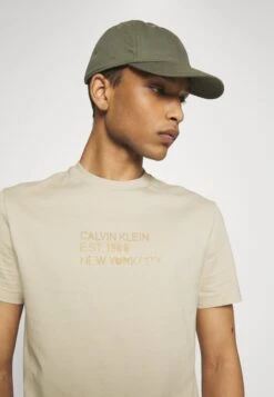 Calvin Klein Mixed Stencil Logo - Print T-Shirt -Stock X 85ae5eb52c924650baf80f03d4fccd53