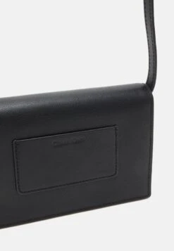 Calvin Klein Iconic Hardware Xbody S Unisex - Across Body Bag - Black -Stock X 8e62258702f74dda911bf78bc79a520c