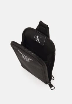 Calvin Klein Jeans Sport Essentials Phone Unisex - Phone Case - Black -Stock X 90a5f4167067401d9e9f3c4a46c3b721