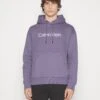 Calvin Klein Hero Logo Comfort Hoodie - Sweatshirt - Cadet 1 Calvin Klein Hero Logo Comfort Hoodie - Sweatshirt - Cadet -Stock X 92c71c65297a475b9de6112614f5e75b