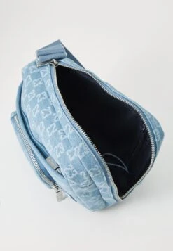 Jordan MONOGRAM SLING BAG - Cross Body Bag - Bleached Denim -Stock X 9cb84a79bbd84adbb8367c0c6bbff643