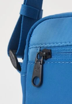 Calvin Klein Jeans GRAPHIC REPORTER - Cross Body Bag - Dark Blue -Stock X 9e4c7db8b0a94cd79ddee3cc39253a45