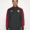 ADIDAS PERFORMANCE Manchester United Dna Tracktop - Training Jacket - Schwarz 1 ADIDAS PERFORMANCE Manchester United Dna Tracktop - Training Jacket - Schwarz -Stock X a01d5c70cfb64f6185327323cab5b827