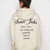 Sean John Logo Peached City Backprint Hoodie - Hoodie - Beige -Stock X a50e9b18196041a6a82f247537a67a3b