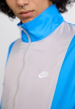 Nike Sportswear CLUB - Tracksuit - Light Photo Blue/obsidian/college Grey/white -Stock X a8156810e793449db0b4cdfaa9b13c35