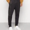 CARLO COLUCCI Joggerpants Unisex - Tracksuit Bottoms - Black -Stock X a8ee0c4b6f13429c8873174de2a6c696