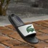 Lacoste SERVE SLIDE DS 225 - Mules - Black/white