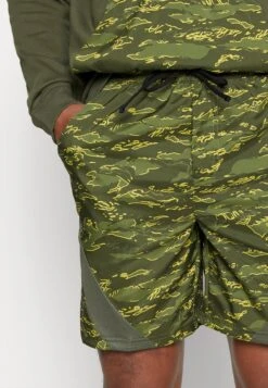 Puma Train Concept- Sports Shorts - Green Moss 15 Puma Train Concept- Sports Shorts - Green Moss -Stock X b058aa8086534d51989206402c4e23f4