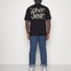 Calvin Klein Matte Back Logo - Print T-Shirt - Black -Stock X b18e4c36606540029326cb09e5da394c
