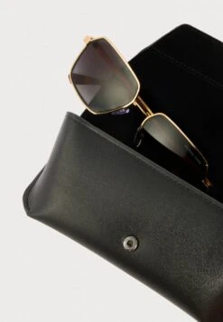 Michael Kors DANA POINT - Sunglasses - Shiny Yellow Gold-coloured/dark Grey -Stock X baa9661176844a40b4485a482892310a