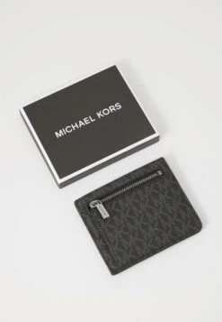 Michael Kors COMPACT ZIP UNISEX - Wallet - Black -Stock X c08d29ed7e734e89bf5e08fb9f428c7a