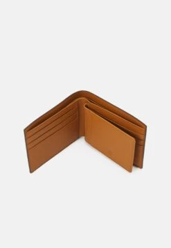 MCM Veritas Fold Wallet SmallUnisex Set - Wallet - Cognac 11 MCM Veritas Fold Wallet SmallUnisex Set - Wallet - Cognac -Stock X c223fd7bbd9f461c8228922ebf03a7b2
