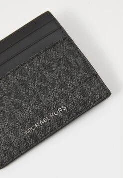 Michael Kors COMPACT ZIP UNISEX - Wallet - Black -Stock X c3646217e1ec4174be57c89628247116