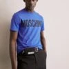 MOSCHINO Print T-Shirt - Fantasy Blue 1 MOSCHINO Print T-Shirt - Fantasy Blue -Stock X c3ad03c9bcbb4a7e906aad3c443b8459