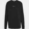 Han Kjøbenhavn Casual Long Sleeve Cursive - Long Sleeved Top - Black -Stock X c4063a1975c74ee2a54b8f85139747e9