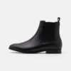 Coach Metropolitan Chelsea Boot - Classic Ankle Boots - Black 2 Coach Metropolitan Chelsea Boot - Classic Ankle Boots - Black -Stock X c496c314377440faba7a36376997632e