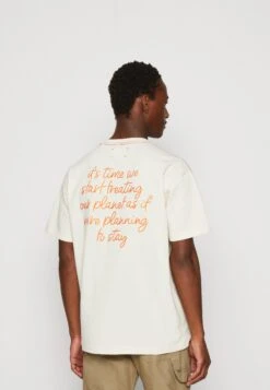 Reborn Loose With Embroidery At Back - Print T-Shirt - Buttercream