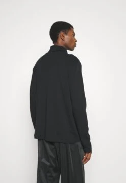 J.Lindeberg Aydin Embroided Turtle Neck - Pyjama Top - Black -Stock X c836940652d1450989f2e24b3090ff95