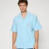 BOSCO BUTTON UP - Print T-shirt - Light Blue -Stock X caeb7770926f4e9fa8f1bb1603a170ba