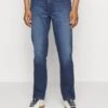 Wrangler Texas- Slim Fit Jeans - Star Man -Stock X cd1f32a1823e4f659d25b0f4686c79e7