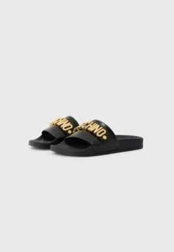 MOSCHINO Slippers - Nero -Stock X cf90a8c587824f4e9f83ce0a00939e69