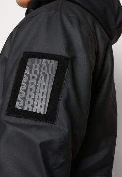 Rains Glacial Coat Unisex - Winter Coat - Schwarz -Stock X d7a16e9aca6c4fc88c7c30ed59ceccba