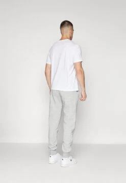 Champion ICONS CUFF PANTS - Tracksuit Bottoms - Grey -Stock X d902cfca1bbd4479bbe0c7167452dbc1