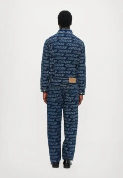 REPEAT LOGO TRUCKER JACKET - Denim Jacket - Indigo -Stock X dd2b3236577143d9bf8f6ee58c46a111