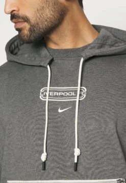 Nike Performance Liverpool Fc Standard Issue Hoodie - Sweatshirt - Charcoal Heather/Pale Ivory -Stock X e1b05792b51c4fbbb737280ad88cf6e5