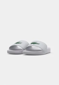 Lacoste SERVE SLIDE 125 - Mules - White/green -Stock X e8d7a8186ec34a2ab0252408a43f69ac