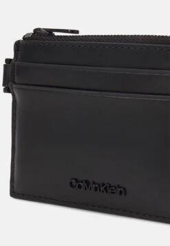 Calvin Klein Median Holder Zip Unisex - Wallet - Black -Stock X ec0b5f6e9ba846df8d9555aa995fe974