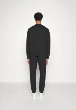 Calvin Klein Gloss Stencil Logo Jogger - Tracksuit Bottoms - Ck Black -Stock X edef059193f440e492ae9a040d3eaab2