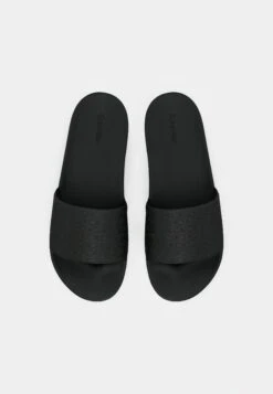 Calvin Klein POOL SLIDE MONO - Mules - Triple Black -Stock X efc14ea2aec14a968aae60db06016819