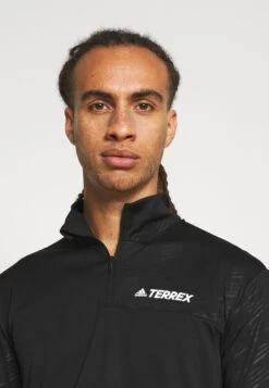 ADIDAS PERFORMANCE Mt Half Zi Ls - Long Sleeved Top - Black -Stock X f132ef368128408fa8e19142b1889321