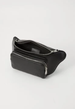 Calvin Klein STRAP WAISTBAG - Bum Bag - Black -Stock X f1cc4e17e69b44c59dbee3a04fc14a24