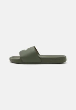 Lacoste SERVE SLIDE 125 - Mules - White/green -Stock X f503043e4c0940b39f0c0a5b654d130c