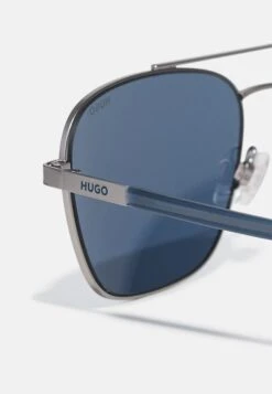 Hugo Sunglasses - Matte Ruthenium -Stock X f79c43002d8b4f459adba2f1cd039a5f