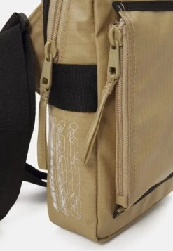 Lacoste Street Balance Unisex - Across Body Bag - Lion Noir -Stock X f7e30c77286942b294639d516122179a