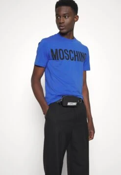 MOSCHINO Print T-Shirt - Fantasy Blue 15 MOSCHINO Print T-Shirt - Fantasy Blue -Stock X ff24ea95dd6a47e08b18a4f35cc7ae6a