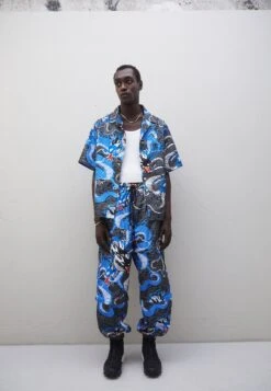 Unisex - Button-Down Blouse - Blue/Black -Stock X ff8345a1795d457c99502bdb933c7411