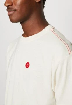 Reborn Loose With Embroidery At Back - Print T-Shirt - Buttercream -Stock X ff8c5187651b40968968193ed473d41e